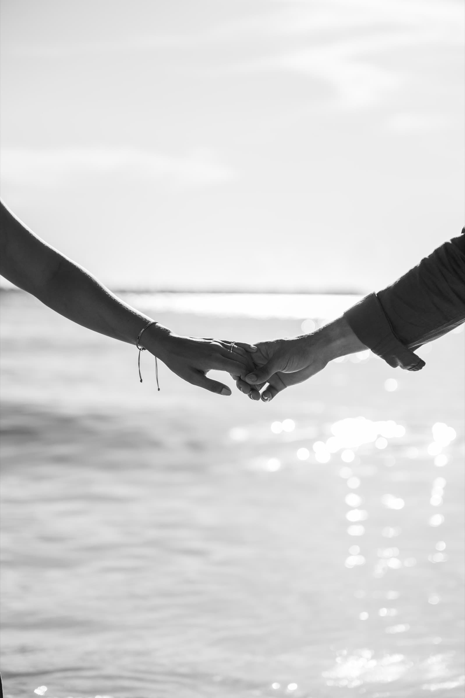 Franchesca & Linero, hands at sunrise