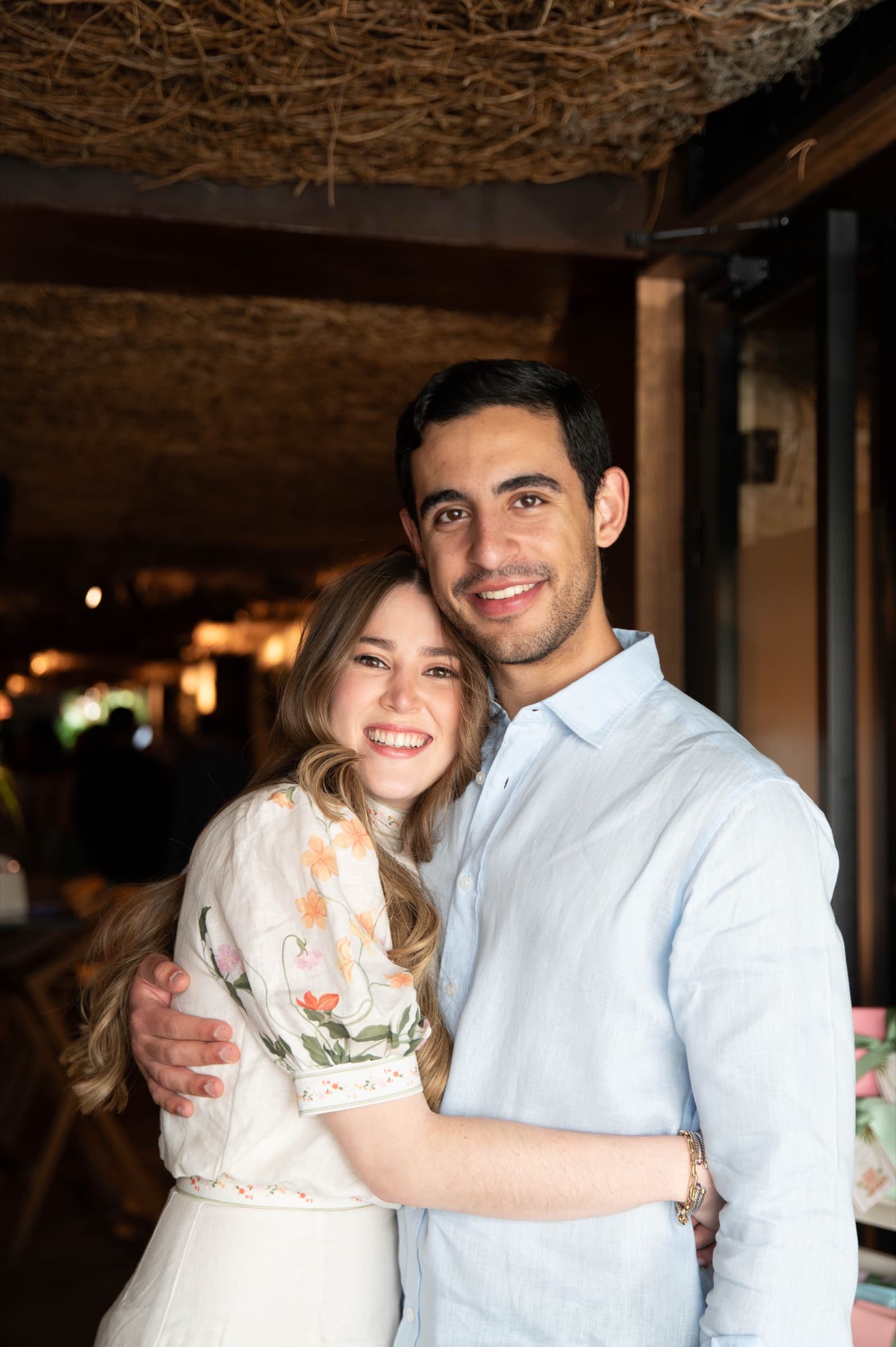 Luciana with her fiancé at her bachelorette dinner